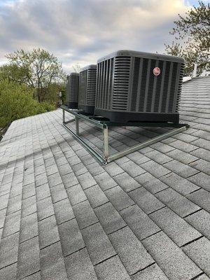 Custom condensers roof platform for a six apartment building.