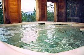 Shomo's cabin has a huge (8 person) hot tub with a good mountain view