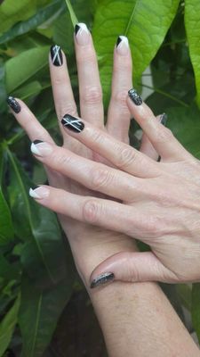 Freehand gel manicure designs on natural nails by Linh at Fendis