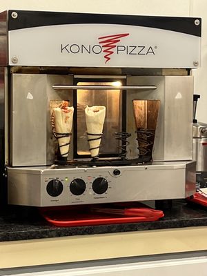 Pizza Kone machine, each is cooked to order