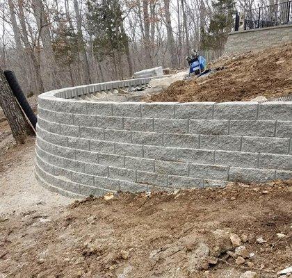 Retaining walls add beauty and value to your home.  They can also help with erosion control.