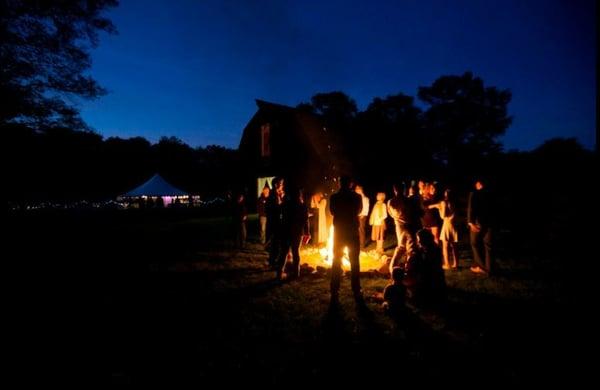 Best shot I have to show setup-ceremony in front of barn,lawn games next to the tent, & dinner/dancing in the tent. He made it all work!