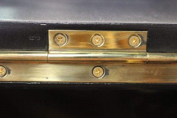 Black lacquer smudges on screws after finishing Bechstein.