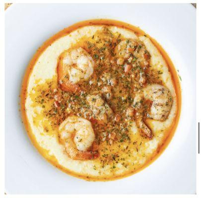 Shrimp & Grits...

Creamy Cheddar Grits with Sautéed Shrimp tossed in our Special Sauce with Diced Tomatoes and Parsley.