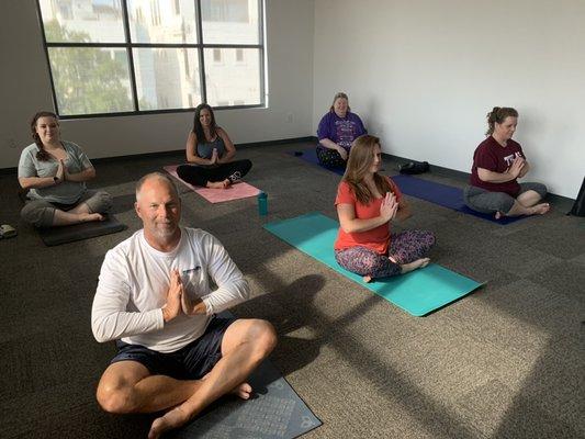 The Daniel Group enjoying a Friday afternoon yoga class