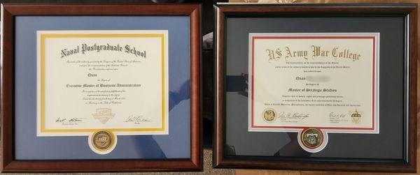 The frame and matte Erik did on the left. The sample on the right. Great job selecting colors that went with the school's theme.