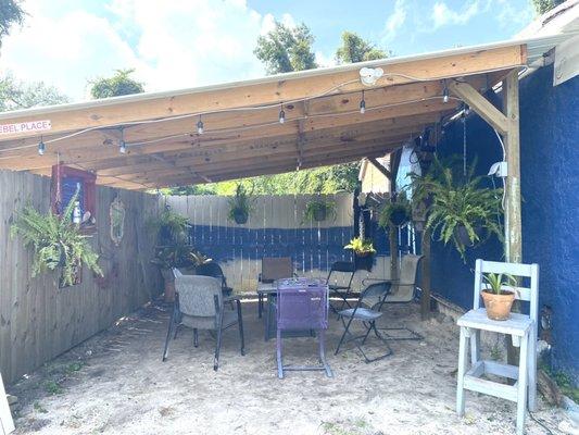 Just one of the covered seating areas in our Cozy Courtyard