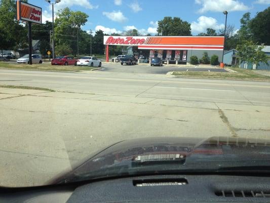 FRONT OF STORE AND PARKING LOT