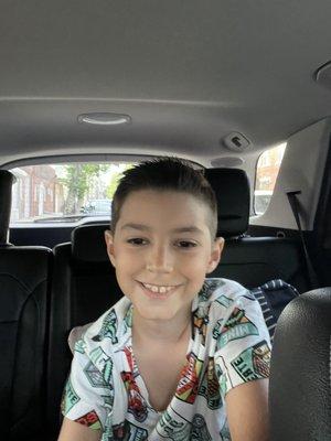 My son's hair cut.