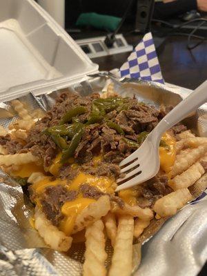 Sliced ribeye cheese fries .. super huge and delicious