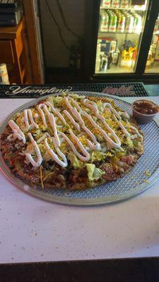 This is the Taco Pizza .. only on Sunday's when Monica is working the night shift .. amazing place .. good people .. where friends meet !!