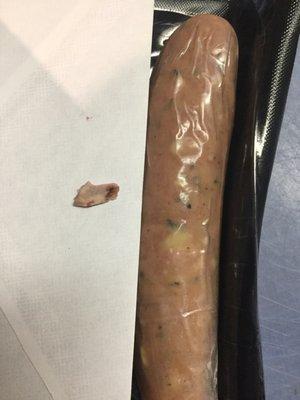 Bone fragments found in this package of Aidell's roasted garlic and GRUyere cheese smoked chicken sausage in February 2019