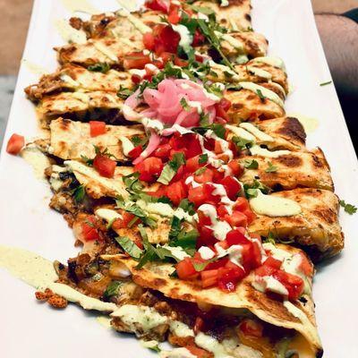 Quesadilla with chicken and signature sauce