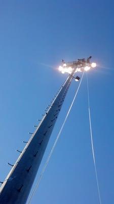 Servicing the sports lighting at Isotopes Park