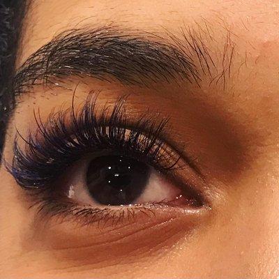 Volume lashes with blue mixed in