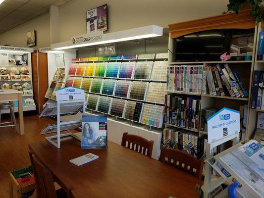 Paint color wall and wallpaper books go hand in hand