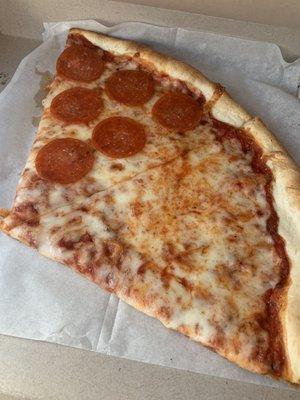 Slice of cheese pizza and slice of pepperoni pizza