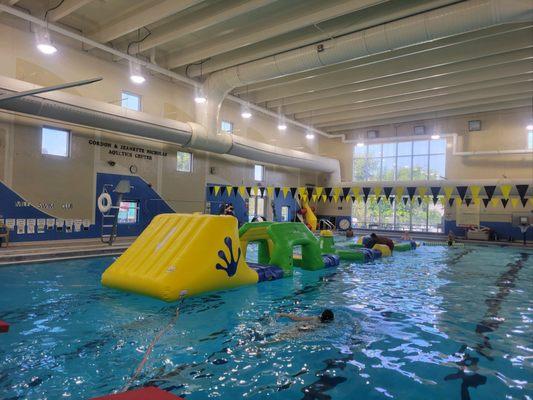 Playing on the Wibit floating obstacle course.