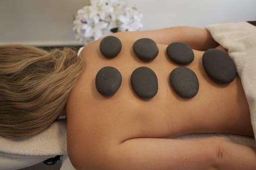 Relax with a hot stone back massage