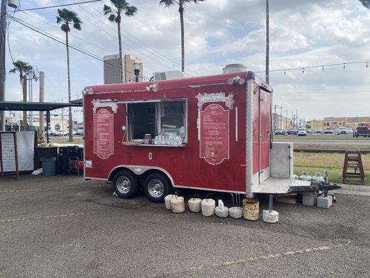 Daytime photo of the Food truck before set up for service.