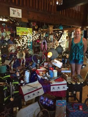 Tasha, owner of Art*cetera, in one of many interesting spots in her 2-story gift shop*gallery.