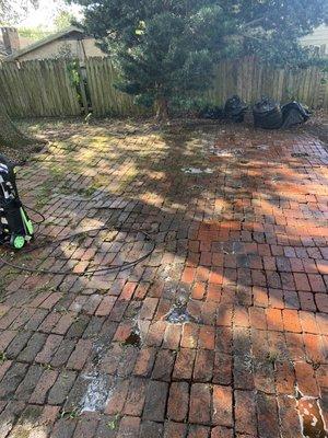 Pressure washing underway