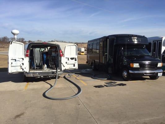 Cleaning a party bus for VIP limo after a night of partying