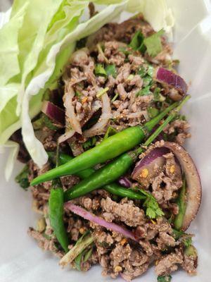 Cook beef larb