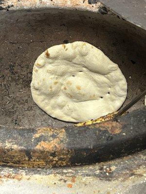 Milky Naan in the Tandoor baked fresh when ordered.