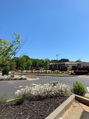 Rearview of lot car wash with free self-vacuuming. This place is quick, easy and affordable!