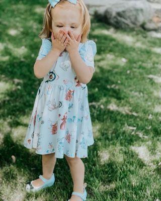 Alice in Wonderland print dress.