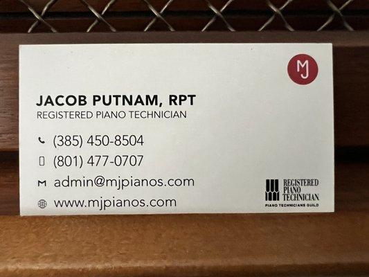 Business card of the technician performing the tuning and repair of our piano.