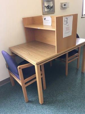 Individual desks outline the books