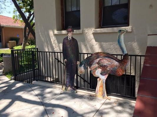 Henry E. Huntington lounging with Ostrich buddy.