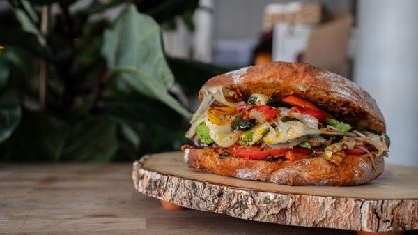 Our FAMOUS Veggie sandwich with Grilled Eggplant, Zucchini, peppers, swiss cheese, and Sundried-tomato and Pesto spread. TRY it with a SALAD