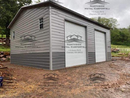 A-Frame Vertical with roll up doors on the side & horizontal wainscoting