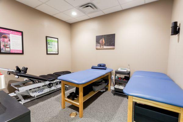 Therapy room for spinal traction, electrical stim, and ultrasound.