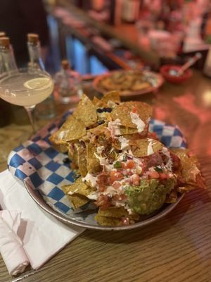 Nachos with pork belly