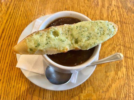 French onion soup with pesto crostini (soup tasted burnt)