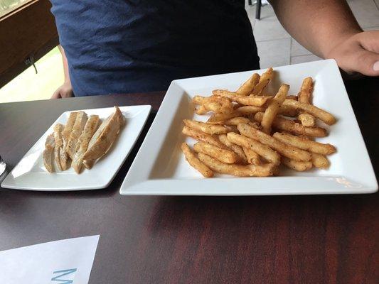 Grilled chicken breast and fries