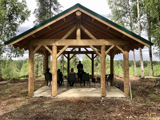 Our hand-built, wooden pavilion with a Denali view! Here, visitors can try out Matthew's Iditarod race sled, which he built himself!