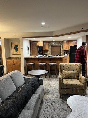 Living room looking at kitchen bar