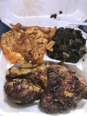 Jerk Chicken with Mac and cheese and Collard greens .