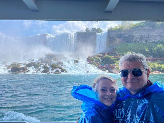 Some travelers cruising on the Maid of the Mist at Niagara Falls on our New England Fall Foliage trip!