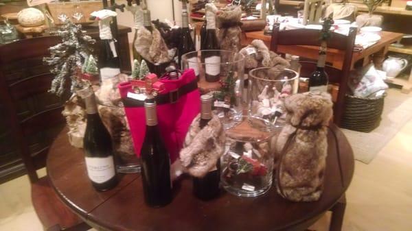 Festive wine featuring bags and covers to dress your bottles.  The perfect hostess gift.