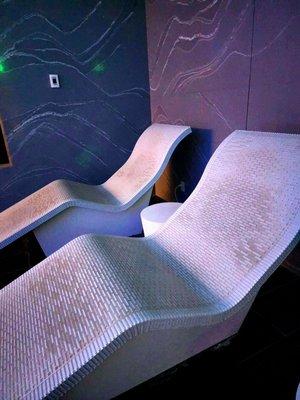 Heated chaise in quartz spa