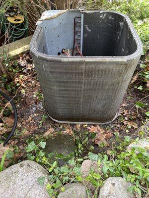 All debris cleared from the condenser coils, allowing proper air flow.