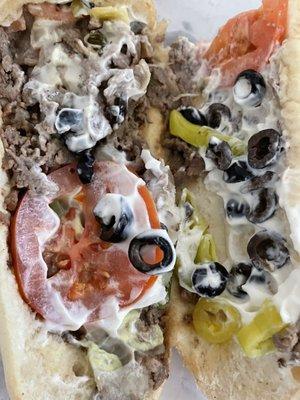 Grand Escape added black olives tomatoes mayo banana peppers