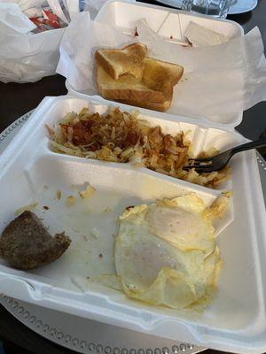 Eggs overeasy sausage hash browns toast