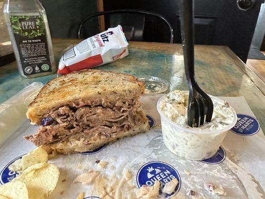 The Educator sandwich comes with chips and a side salad